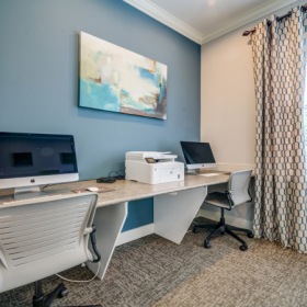 Work Space ample seating and computers in a built-in work space