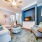 Living area with entries to bedroom, kitchen, foyer