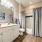Cozy, modern and clean bathroom with wood flooring