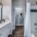 Cozy, modern and clean bathroom with wood flooring